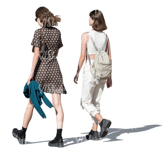 two cut out young trendy women walking in summer