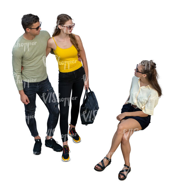 cut out woman sitting and talking to two people standing beside her seen from above