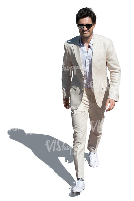 cut out man in a white suit walking seen from above