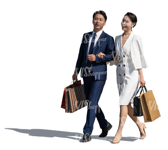 cut out asian couple with shopping bags walking and talking