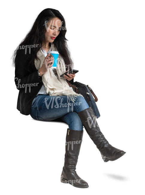 cut out woman sitting and drinkig coffe from a disposable cup
