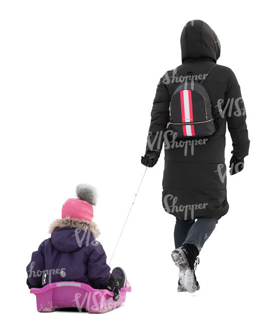 cut out woman walking and pulling child sitting on the sledge