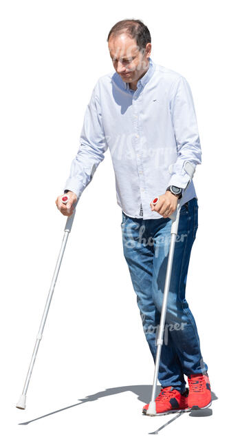 cut out man walking with crutches