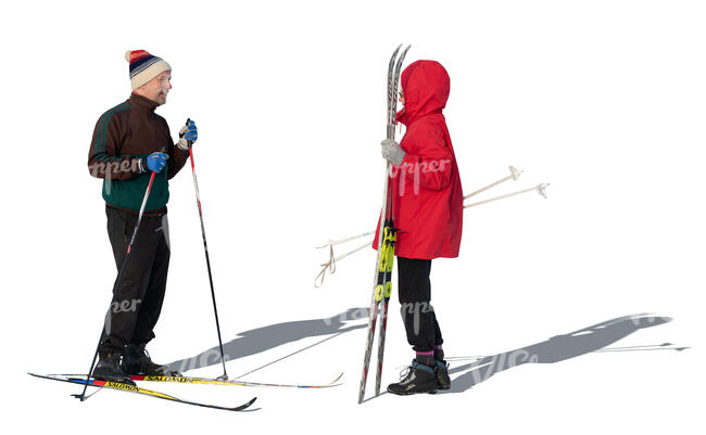 cut out man and woman taking a break while skiing