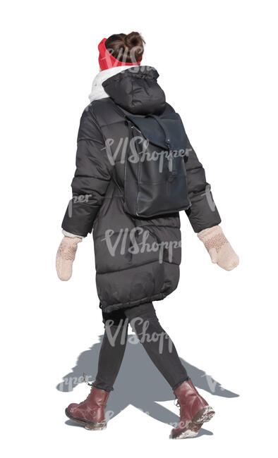cut out woman in a black winter jacket walking