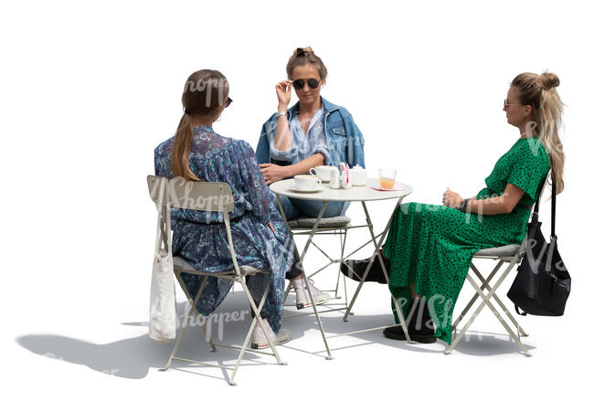 three cut out women sitting in a cafe and talking