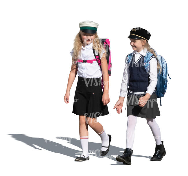 two cut out schoolgirls walking