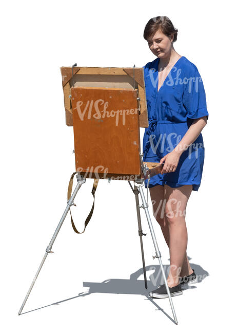 woman painting on an easel