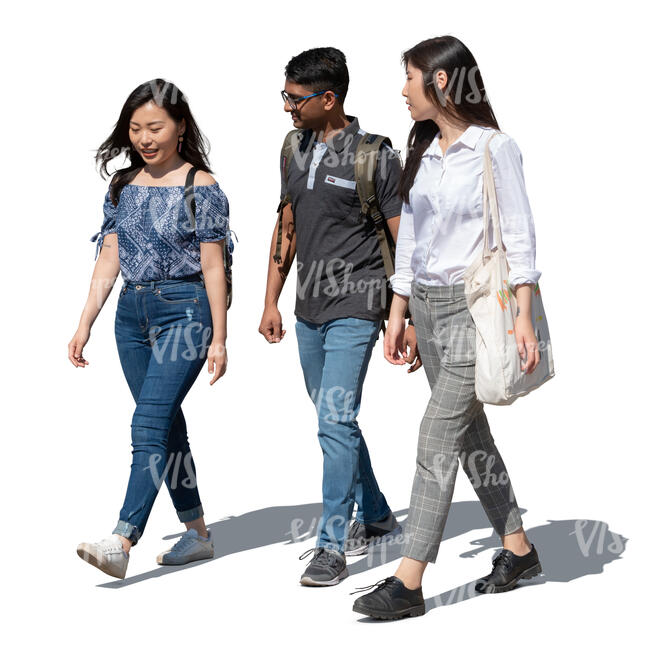 group of three young people walking