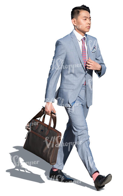 asian man in a gray suit walking