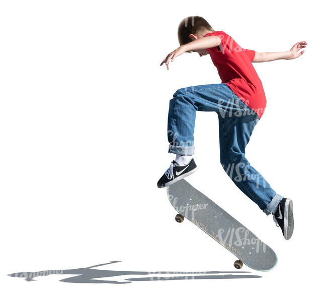 cut out little boy doing a jump on a skateboard