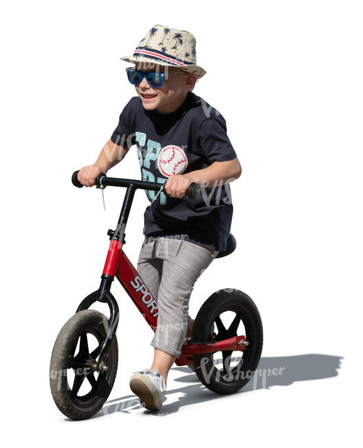 cut out little happy boy riding a bicycle