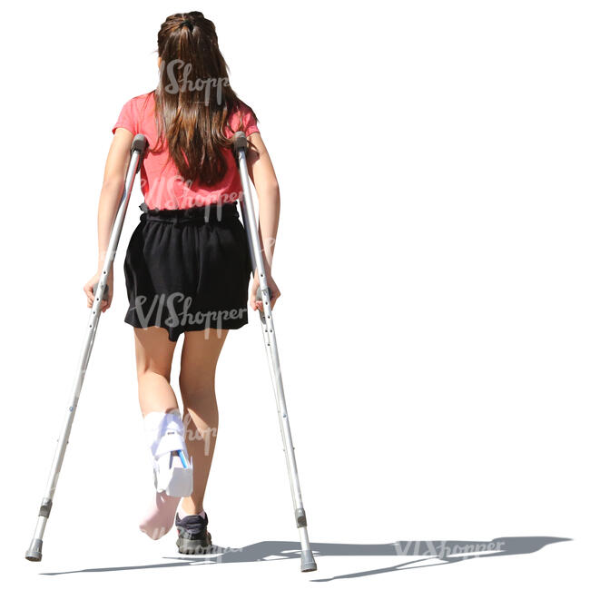 young girl walking with crutches