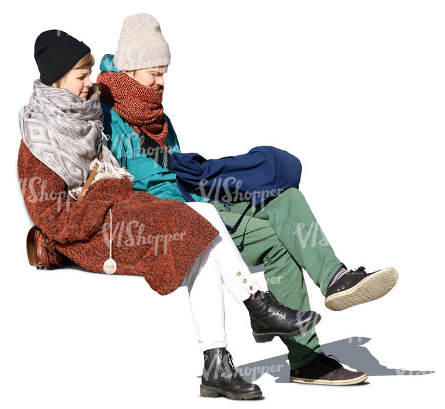 man and woman sitting on a bench