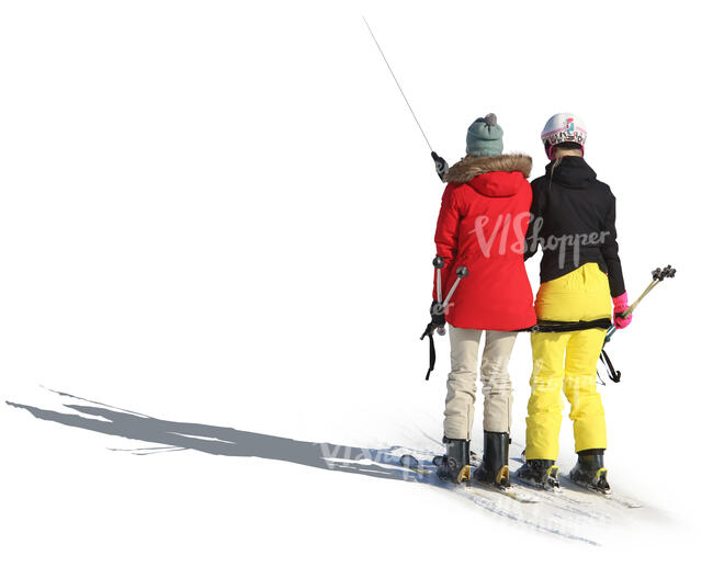 two women riding with the ski lift