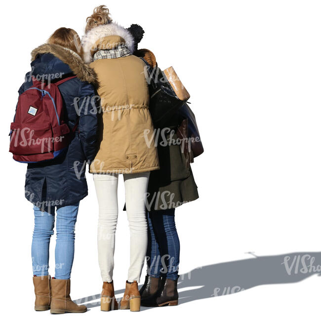 three girls in overcoats standing in a group