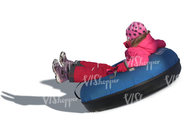 little girl snowtubing