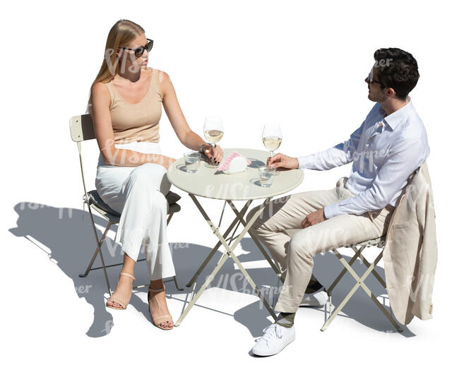 cut out man and woman sitting in a cafe seen from above