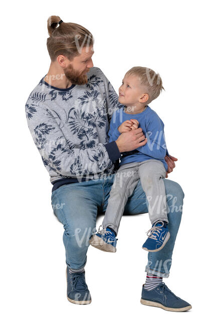 cut out little boy sitting on his fathers knee