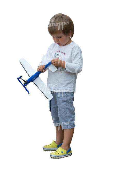 cut out little boy playing with a toy plane