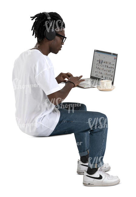 cut out man working with a laptop and drinking coffee