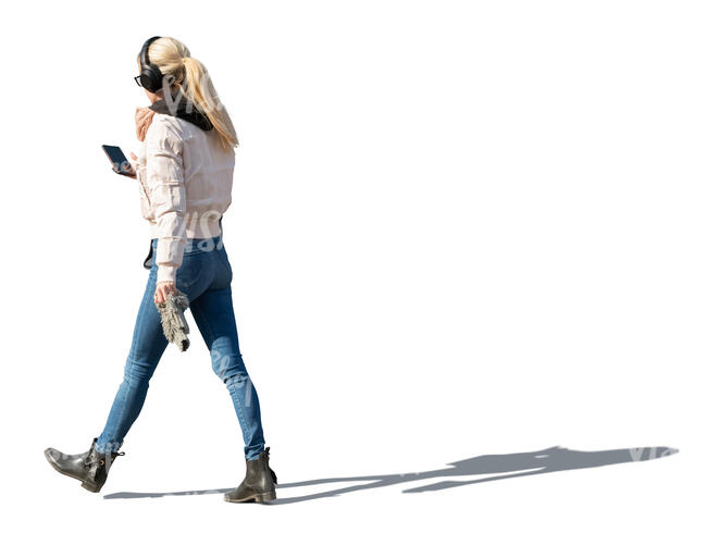 woman walking on sunny autumn day