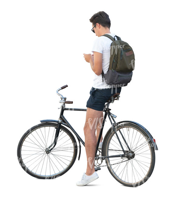 cut out young man stopping while riding a bike and texting