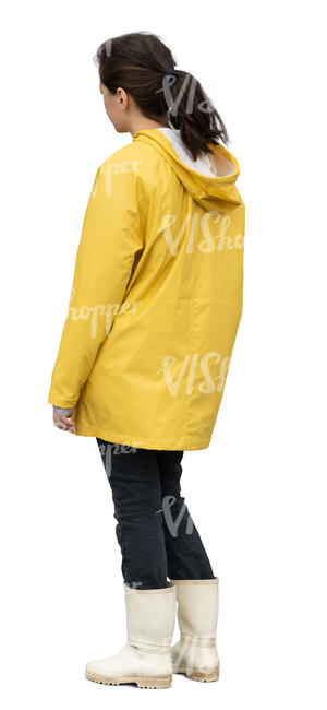 cut out woman in a yellow raincoat standing