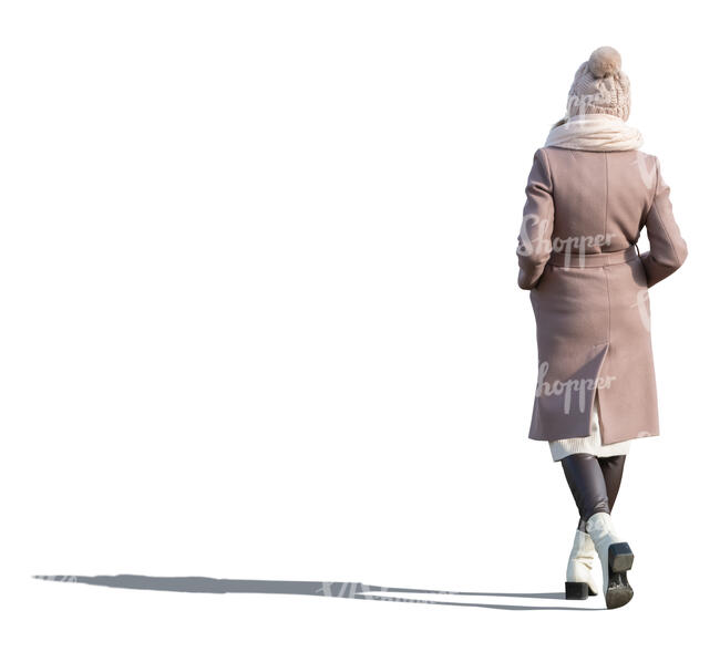 cut out woman in a pink winter coat and hat walking