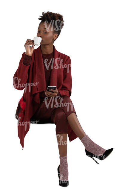 cut out black woman sitting in a cafe