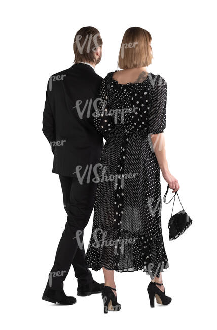 cut out fancy couple walking arm in arm