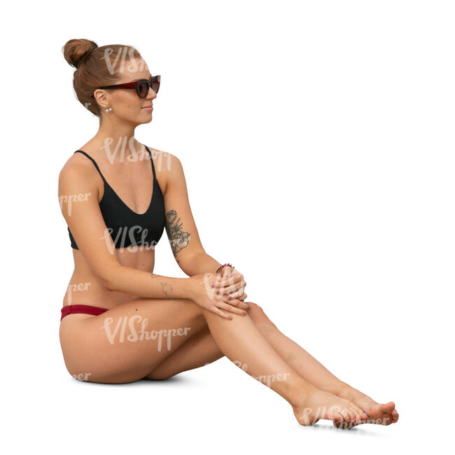 cut out woman in swimwear sitting on the ground