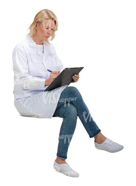 cut out female doctor sitting and writing