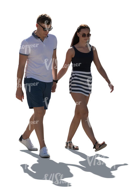 cut out backlit man and woman walking and holding hands