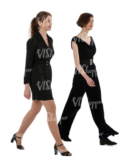 two cut out women in formal black party outfits walking