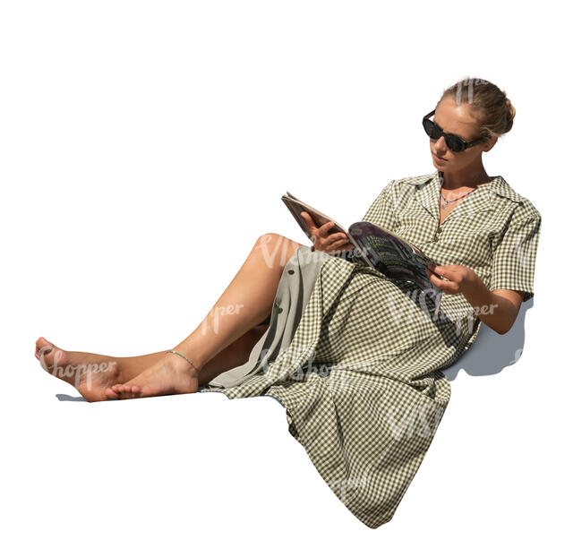 cut out woman sitting on reclining chair and reading a magazine