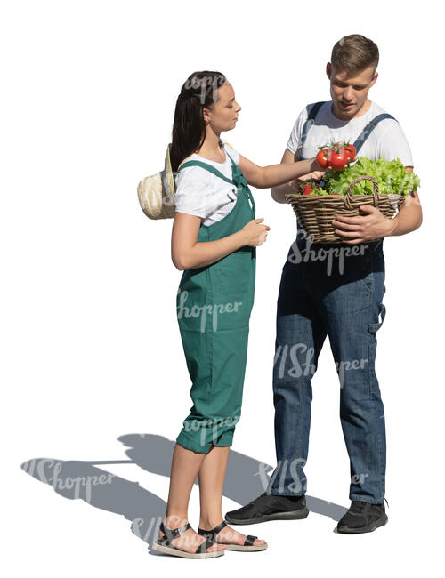 cut out man and woman with a vegetable basket standing in the garden