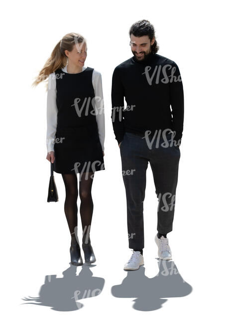 cut out backlit man and woman walking and talking