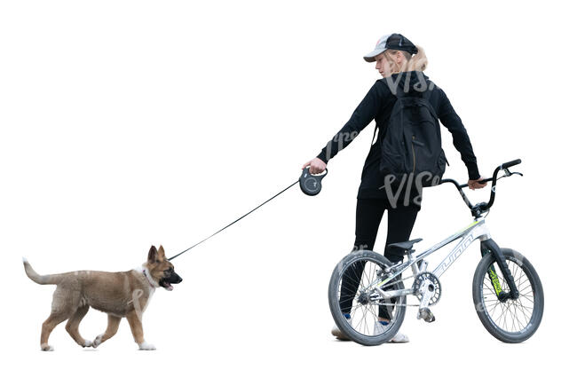 cut out girl with a bike and dog standing