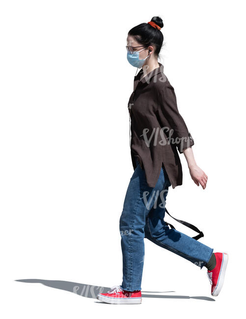 woman with a face mask walking