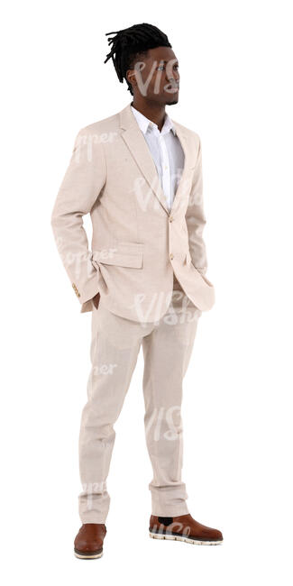 cut out man in a white suit standing hands in his pockets