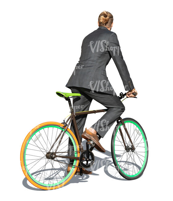 cut out man in a grey suit riding a bike