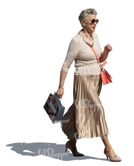 cut out elderly lady with a small shopping bag walking
