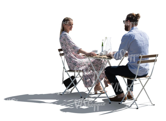 backlit cafe scene with man and womans drinking coffee and talking