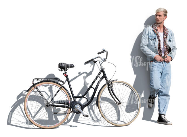cut out man with a bicycle standing and leaning against the wall