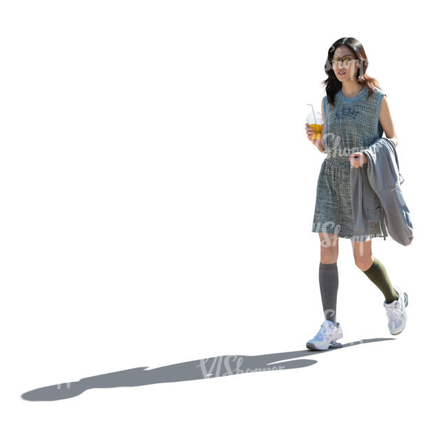 cut out young backlit asian woman walking