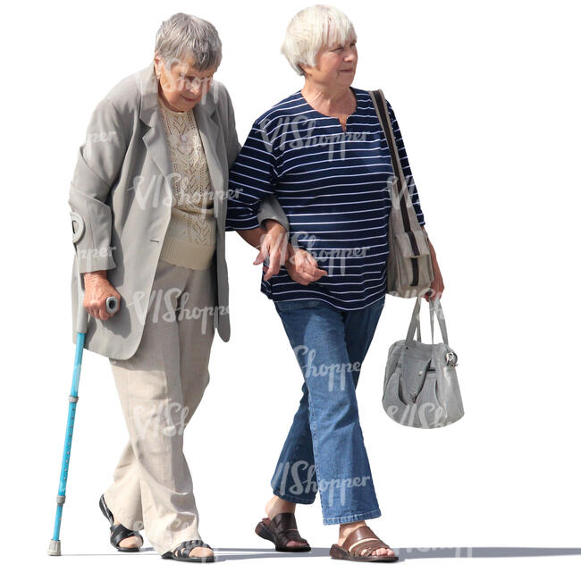 two elderly ladies walking arm in arm