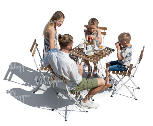 cut out family sitting in an outdoor restaurant seen from above