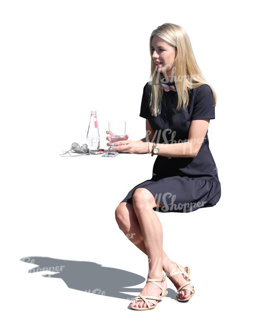 cut out woman sitting in an outdoor restaurant