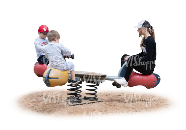 three cut out children playing on the playground